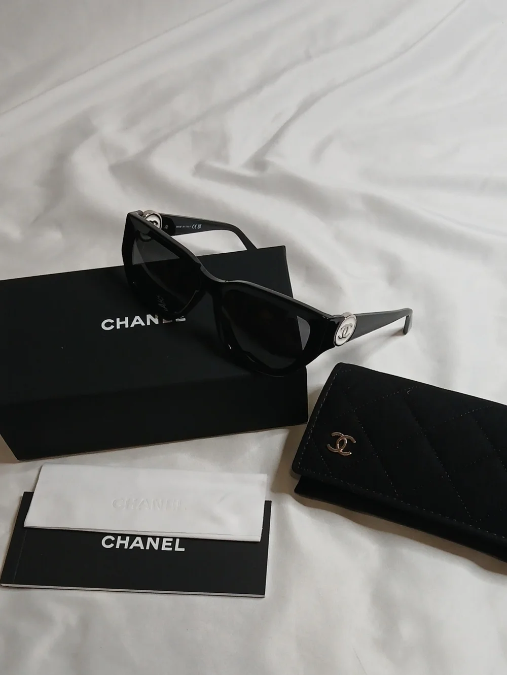 CHANEL Black Cat-Eye Sunglasses with White/Silver CC Emblem
